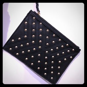 BCBG little black clutch with studs
